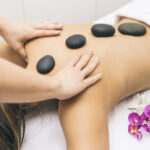 Therapists performing hot stone massage at A++ Asian Massage Lincoln