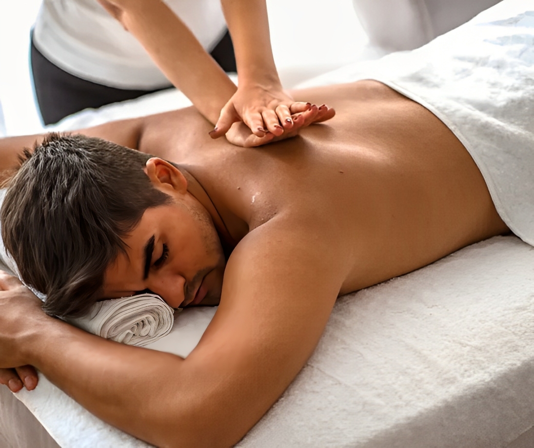 Back massage at A++ Asian Massage Lincoln – therapist easing muscle tension for deep relaxation.