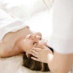 Therapist performing scalp massage at Chinese Scalp Massage Omaha, NE