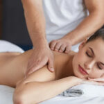 Therapist giving a full body massage at Gangnam Korean Massage Therapy St Joseph