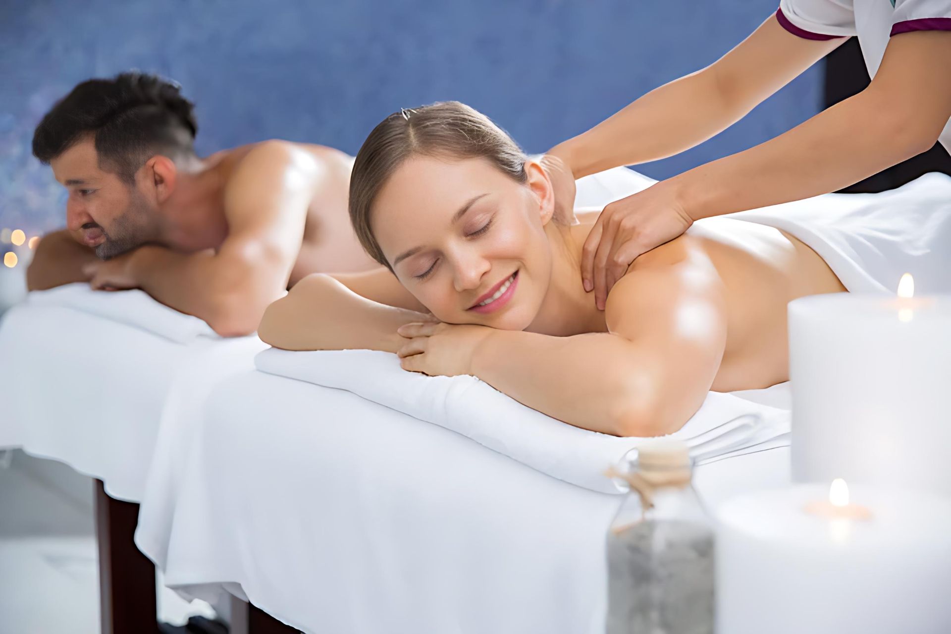 Back massage at Kungfu Spa Kearney – therapist easing muscle tension for deep relaxation for Couple.